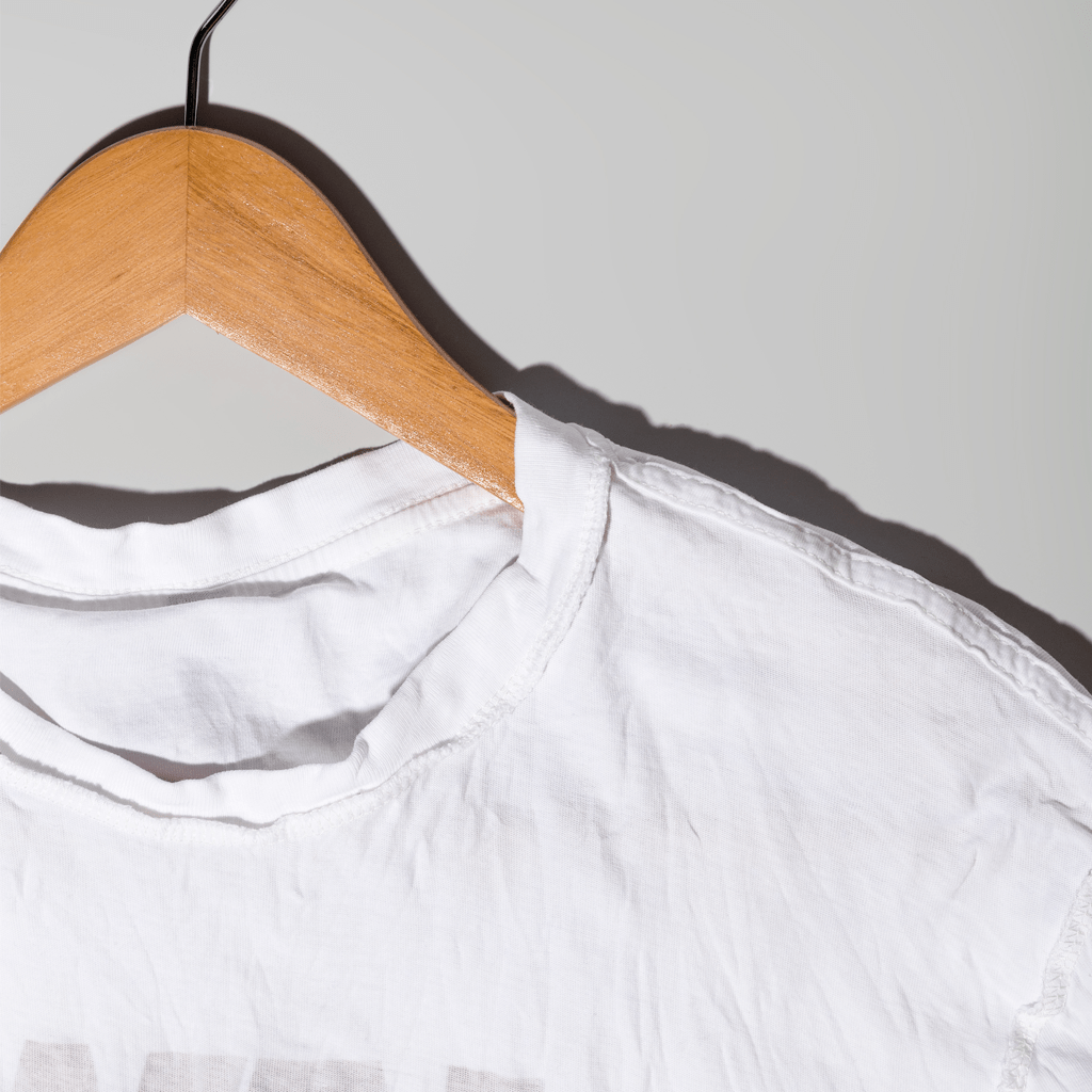 розтягнутий комір на футболці що робити